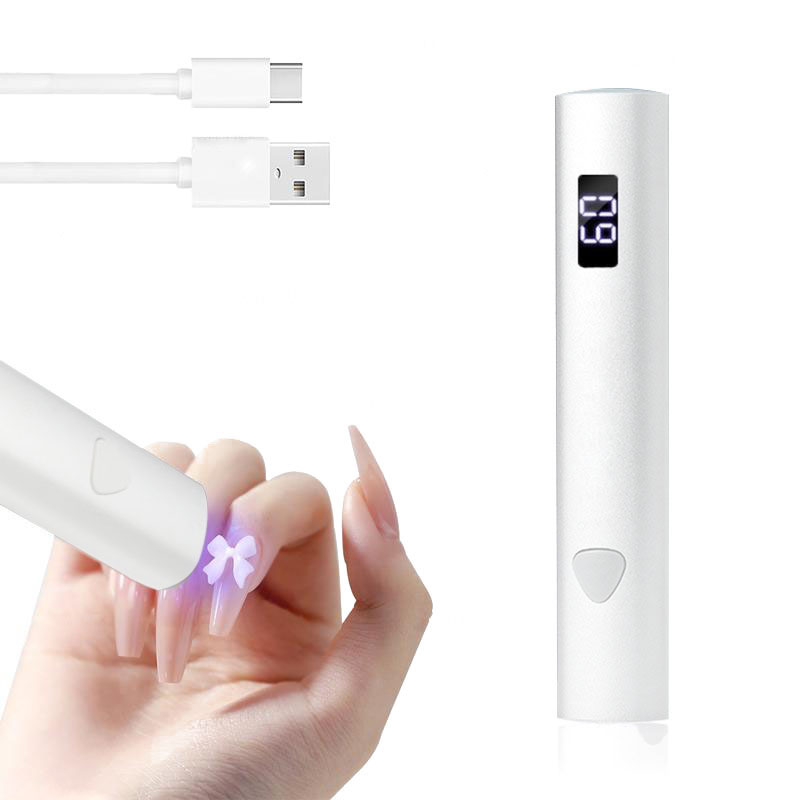 2-in-1 Nail Art Tool – Mini UV Light & Nail Stamper