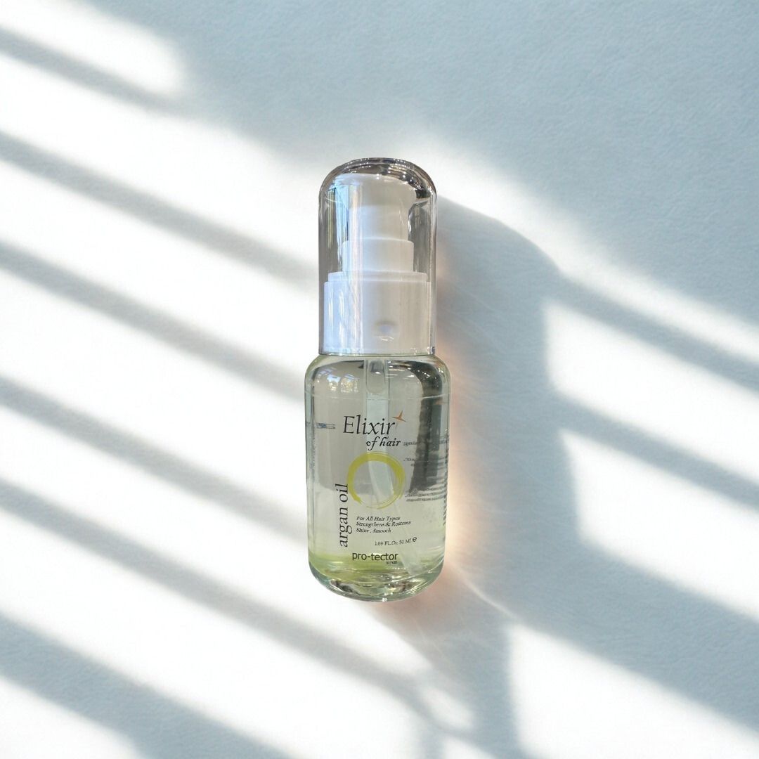 Bottle of 'Elixir of Life' on a light background with shadows