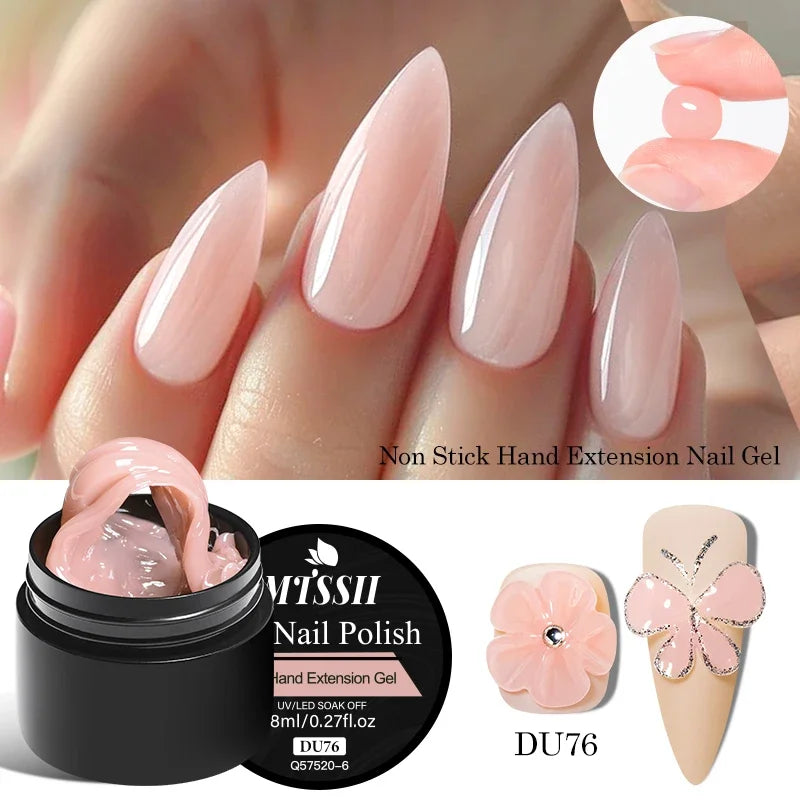 Nail gel with pink nail extensions and a container of nail polish on a blurred background.