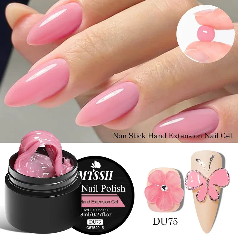 Hand with pink nail extensions, nail gel, and polish bottle with 'Missii' branding.