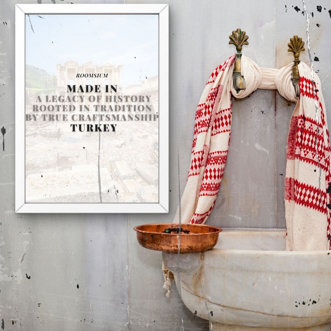 Framed Roomsium heritage sign in traditional Turkish bathroom highlighting craftsmanship