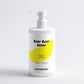 Baby body wash bottle with a yellow label on a white background